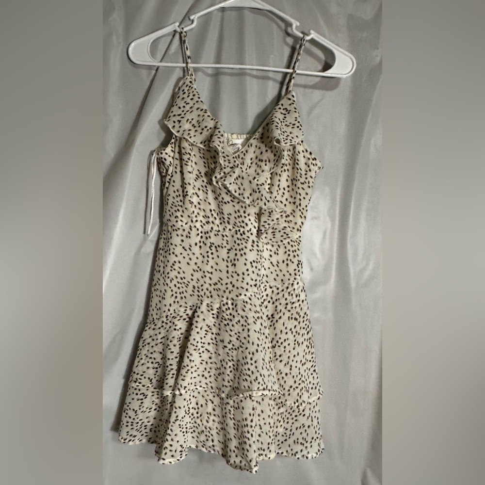 Elegant Cream and Black Ruffle Romper